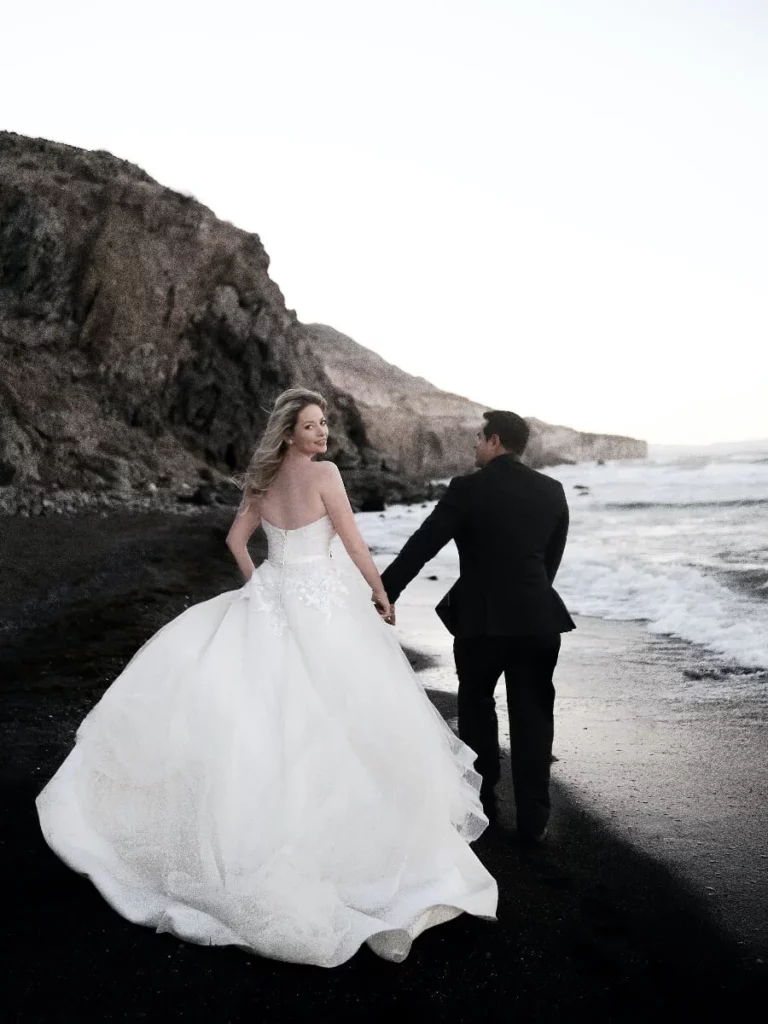 Couple on volcanic beach